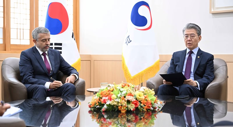 South Korea’s vice foreign minister Kim Hong Kyun, right, meets with Russian ambassador to South Korea Georgy Zinoviev at the Foreign Ministry in Seoul, South Korea (South Korea Foreign Ministry/AP)