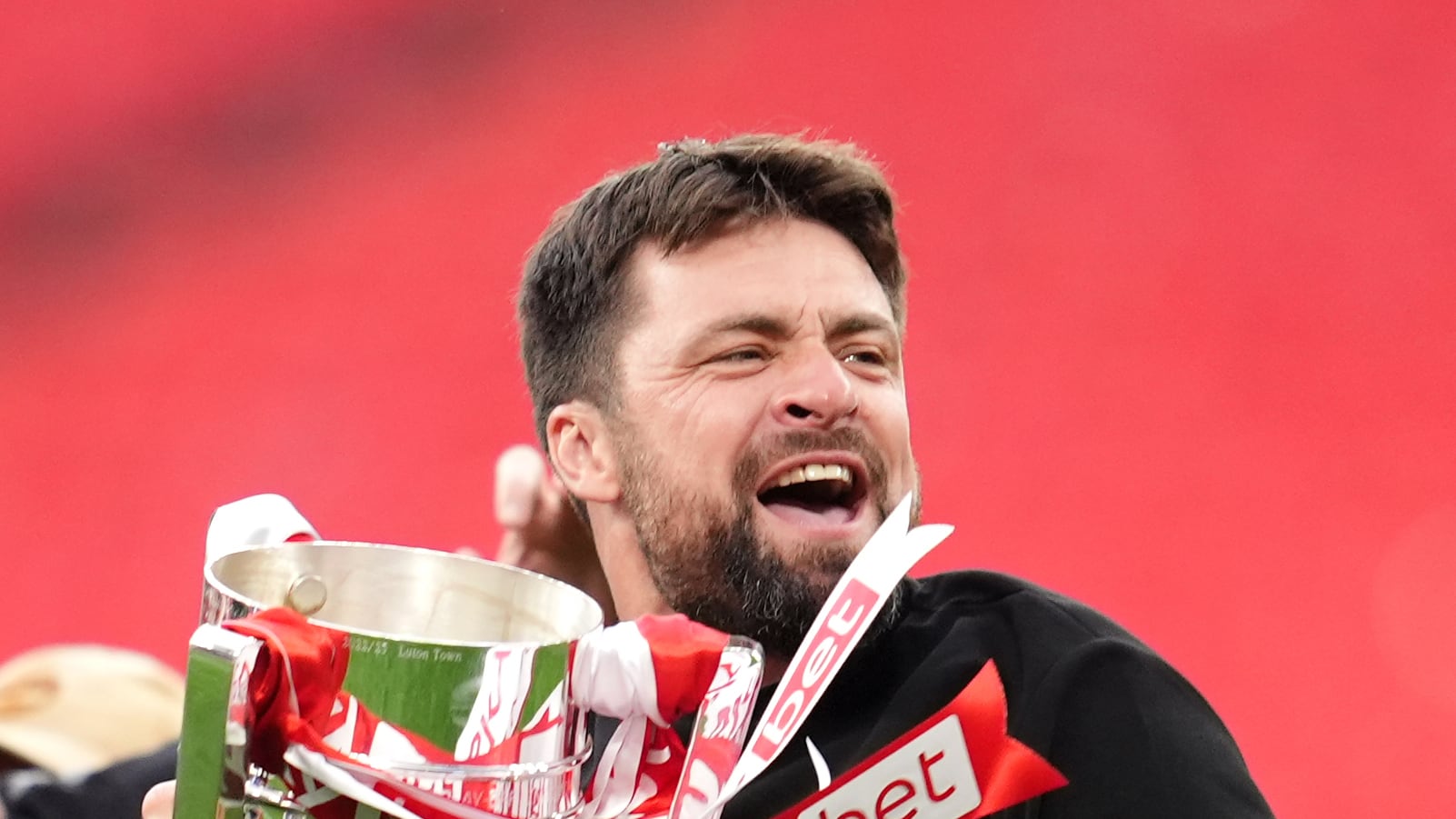 Southampton manager Russell Martin celebrates his side’s promotion after beating Leeds in the play-off final