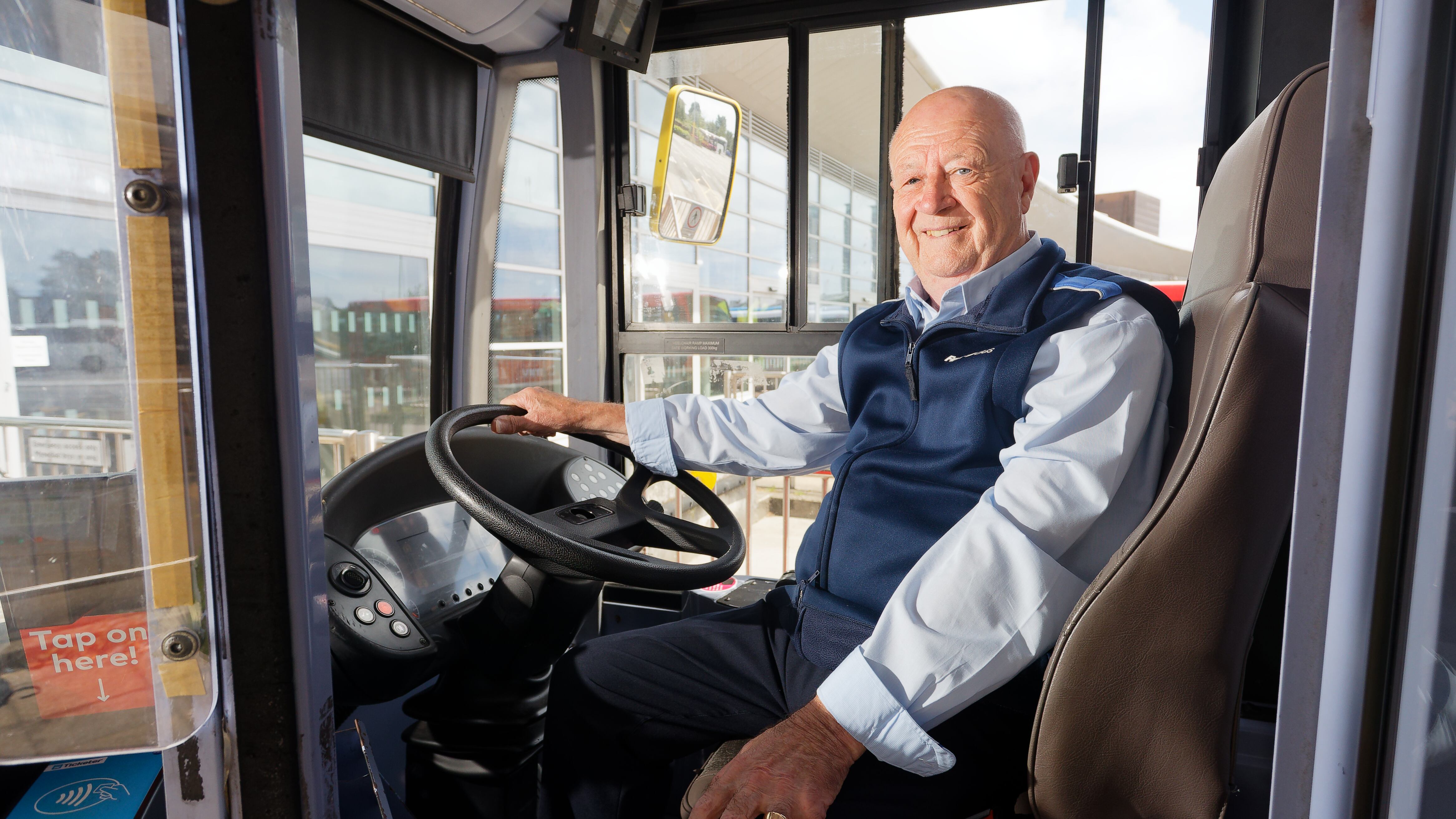 A man believed to be the UK’s longest serving bus driver has vowed to stay behind the wheel