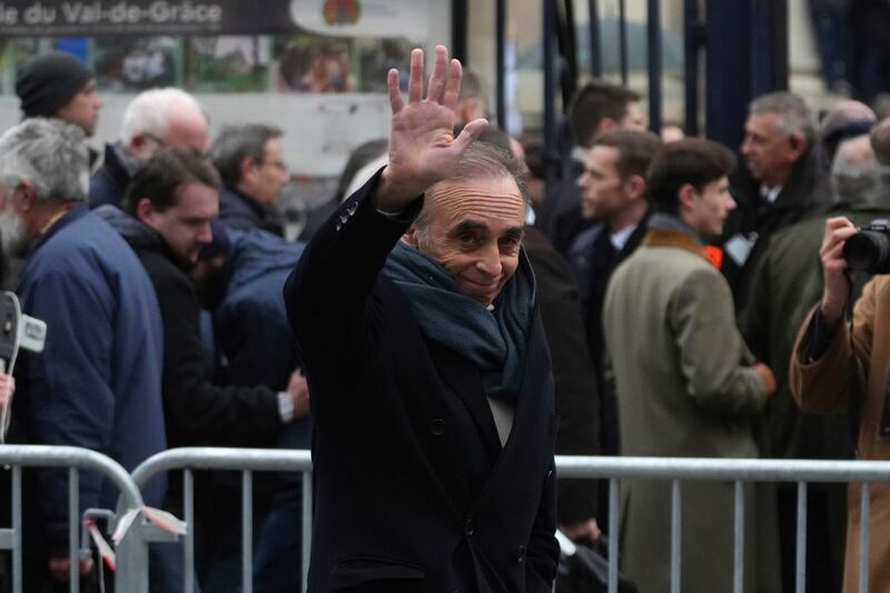 Eric Zemmour, founder of far-right party Reconquete (Renew), waves as he arrives at Notre Dame du Val-de-Grace church (Thibault Camus/AP)