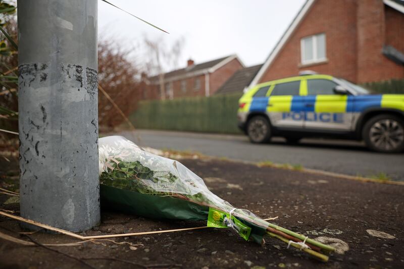 Press Eye - Belfast - Northern Ireland - 16th December 

A cordon is still in place at Laurel Heights in Banbridge, Co.Down, where Karen Cummings was murdered on Saturday night.  The 40-year-old was a mother of two and a childrenÕs nurse. Two men continue to be questioned by the police. 

Flowers pictured at the scene. 

Picture by Jonathan Porter/PressEye