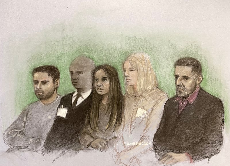 Sarah Sharif’s father Urfan Sharif (right) her uncle Faisal Malik (left), and stepmother Beinash Batool (centre), sitting alongside dock officers at the Old Bailey