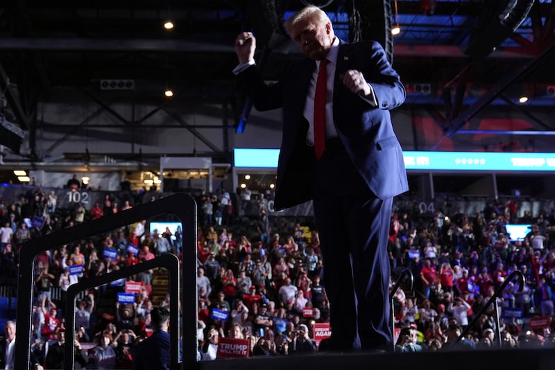 Republican presidential nominee Donald Trump dances during a campaign rally at Santander Arena in Reading, Pennsylvania (Evan Vucci/AP)