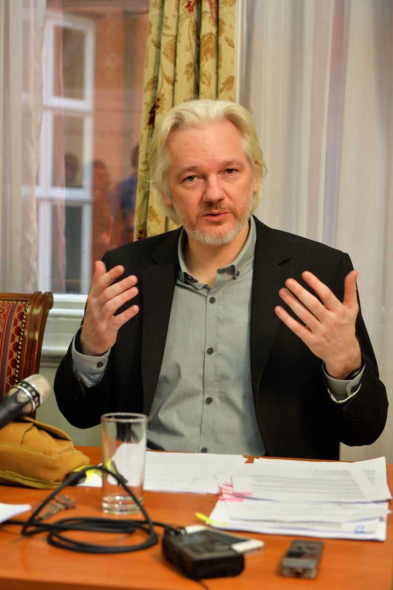 Julian Assange speaks during a press conference inside the Ecuadorian embassy in London