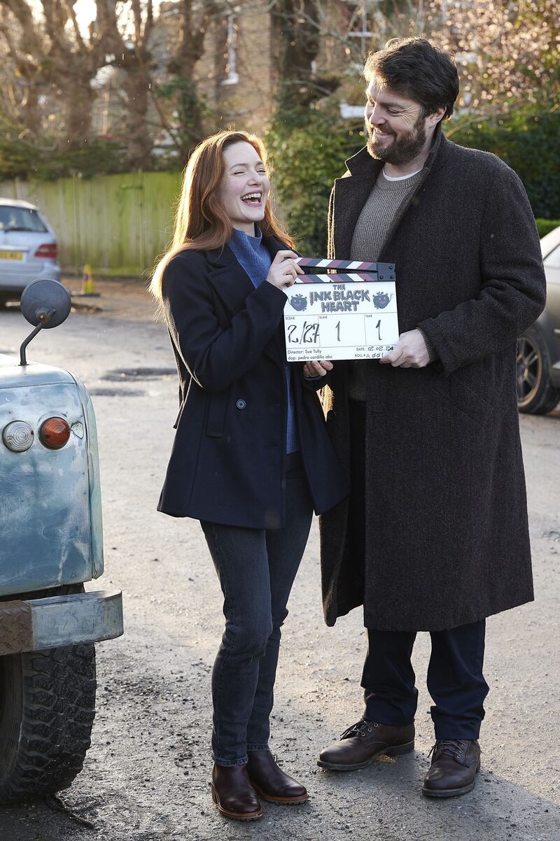 Tom Burke and Holliday Grainger on the set of the Strike- The Ink Black Heart