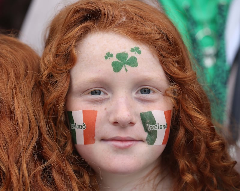 Performers entertain the crowd as  Thousands line the streets for the St Patrick’s day Parade in Belfast on Sunday.
PICTURE COLM LENAGHAN