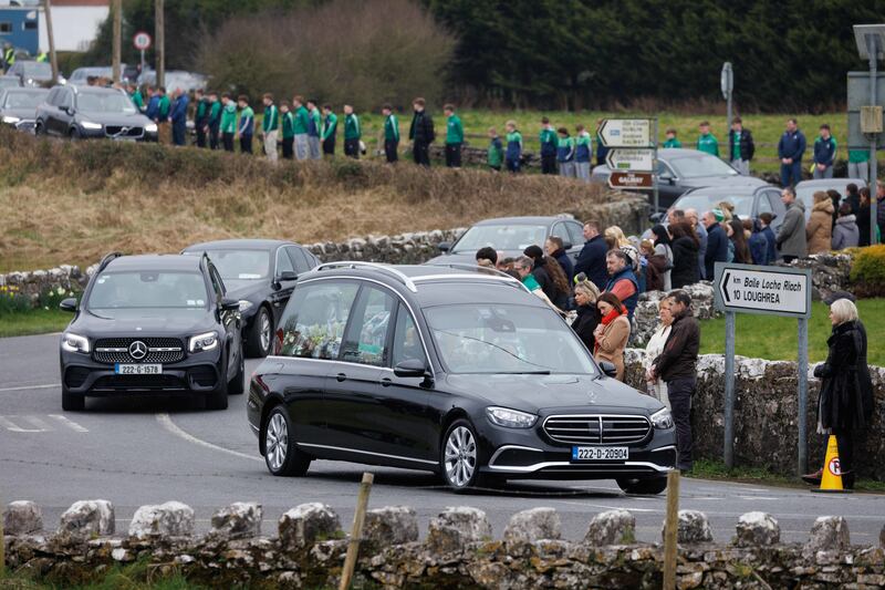 The funeral cortege of 12-year-old Saoirse Ruane makes its way to Saints Peter and Paul Church, Kiltullagh, Co Galway for her funeral