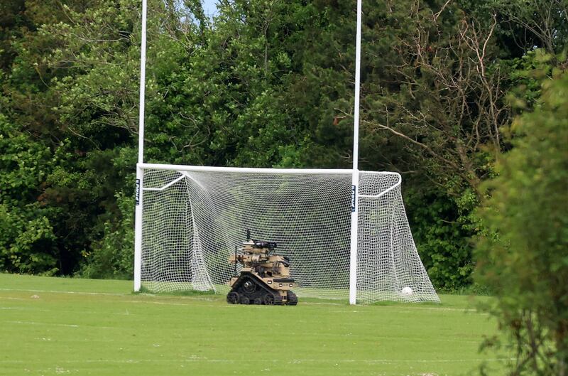 An army bomb disposal robot at the scene of a security alert at the Henry Jones playing fields used by East Belfast GAA. PICTURE: MAL MCCANN