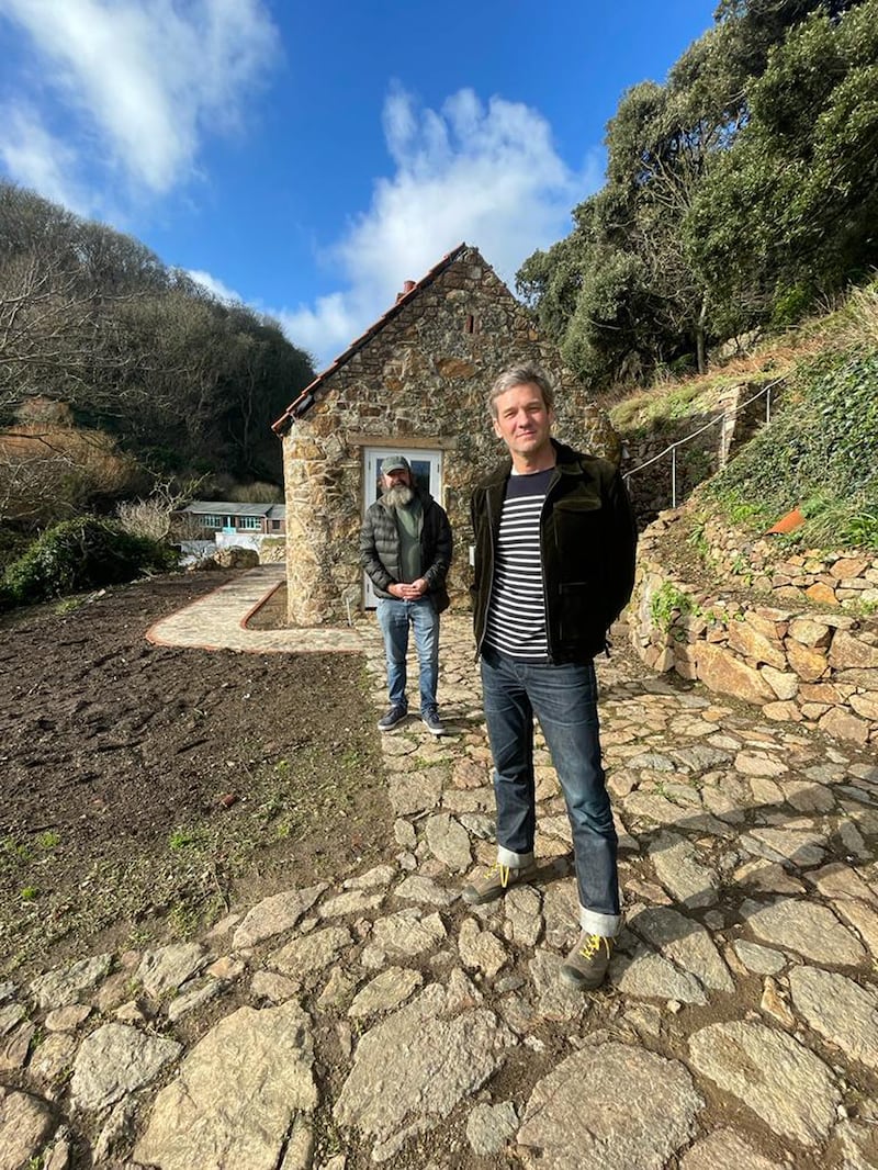 Charlie Luxton (R) and Nik Le Page outside Le Page’s renovated Guernsey cottage