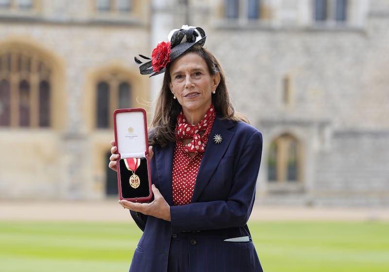 Lady Amis with the insignia of a Knight Bachelor conferred on her late husband, Sir Martin Amis
