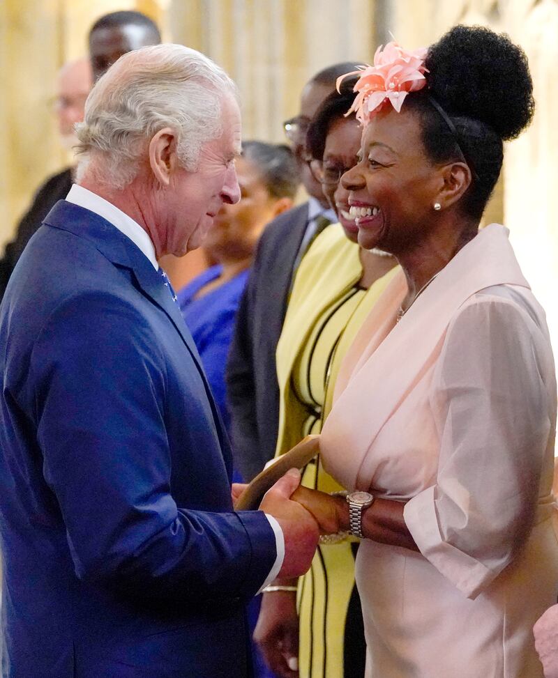 The King speaks with Baroness Dame Floella Benjamin following a service at St George’s Chapel, Windsor Castle, for young people to recognise and celebrate the Windrush 75th anniversary