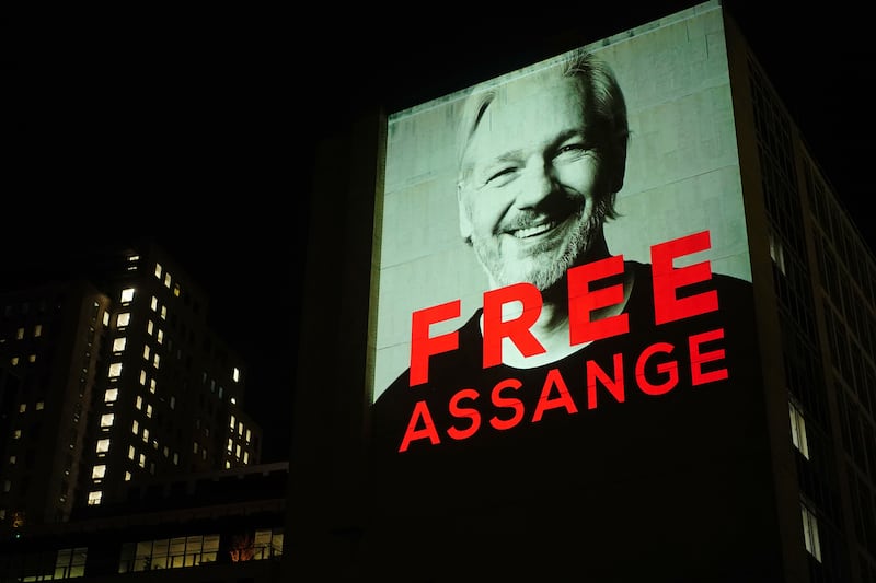 An image of Julian Assange is projected on to a building in Leake Street in central London in 2022 to mark three years since his arrest and detention in Belmarsh prison