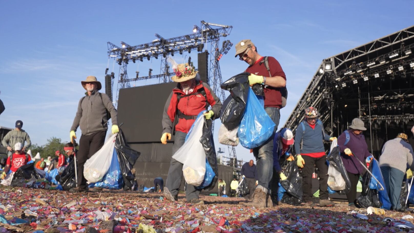 Litter and rubbish being pickup at the end of the Glastonbury Festival at Worthy Farm in Somerset