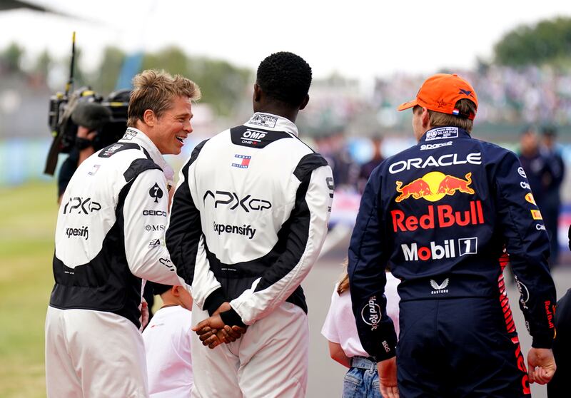 Brad Pitt lined up alongside the drivers – including world champion Max Verstappen – prior to last year’s race at Silverstone