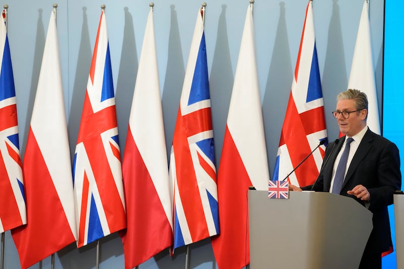 Prime Minister Sir Keir Starmer speaks during a press conference with Polish Prime Minister Donald Tusk in Warsaw (Czarek Sokolowski, Pool/AP)