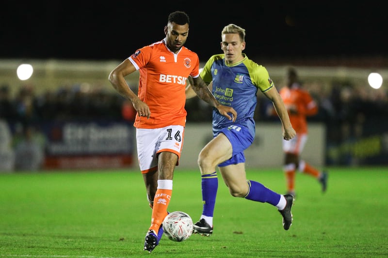 Tilt (left) was given a chance in League football with Blackpool