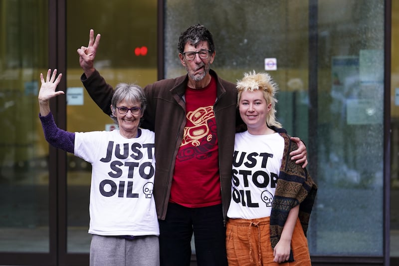 (L to R) Just Stop Oil activists Mary Somerville, Stephen Simpson and Phillipa Green leave Westminster Magistrates’ Court following a hearing at the end of September