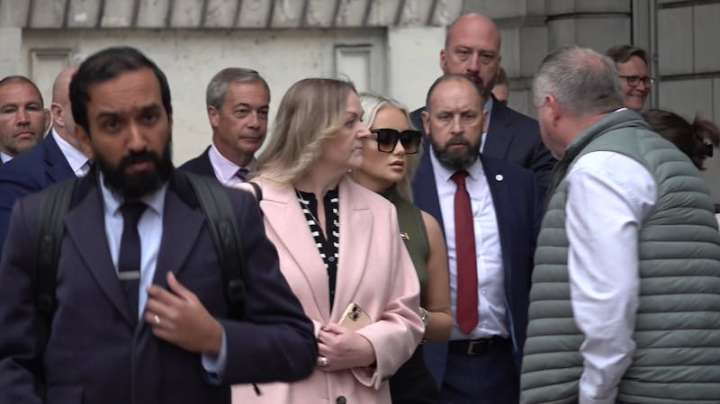 Reform UK leader Nigel Farage (4th from left) and Victoria Thomas Bowen (6th from left) arrive at Westminster Magistrates’ Court