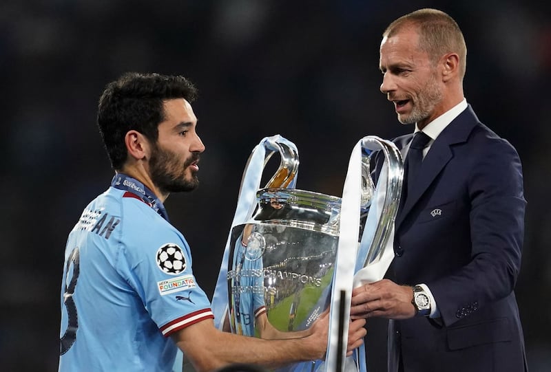 Ilkay Gundogan, pictured accepting the trophy following Manchester City’s Champions League triumph in 2023, has been linked with a return to the Etihad Stadium