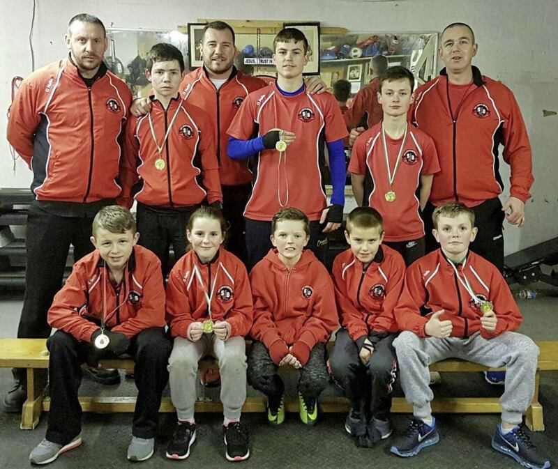 St John Bosco were in seventh heaven at the recent County Antrim Championships, landing seven winners from eight entries - a great start to the club&rsquo;s 75th anniversary year. Pictured are (back l-r) coach Stevie Martin, Noah Cherry, coach Gerard McCafferty, Jack Wilson, Cael Farrelly and coach Gavin Manning; (front l-r) David O&rsquo;Hara, Lucy Farrelly, Gerard Lynn, Torin Manning and Donal Farrelly
