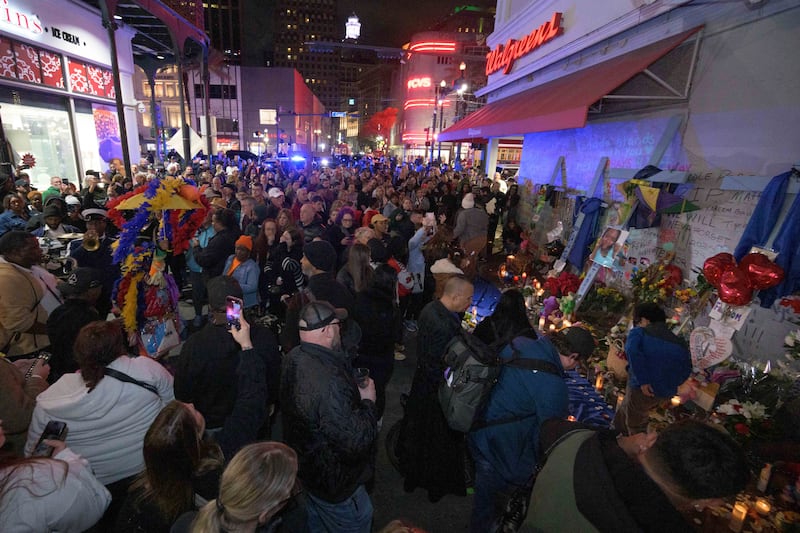 Hundreds attended the memorial to celebrate those who died (Matthew Hinton/AP)