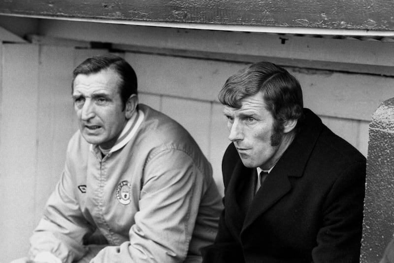 Tony Book, right, during his time as caretaker manager of Manchester City, alongside coach Ken Barnes .