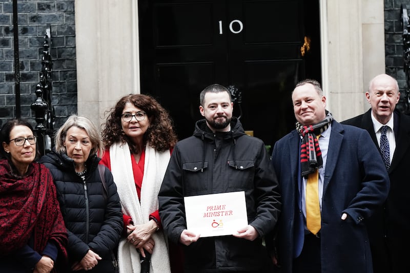 Jason Evans (centre) with other campaigners outside 10 Downing Street