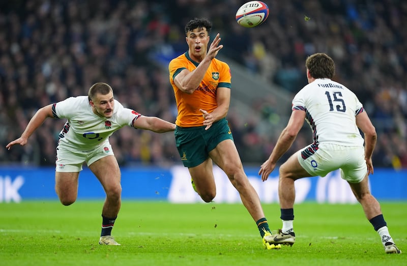 Australia’s Joseph Sua’ali’i, centre, brilliantly created Tom Wright’s try