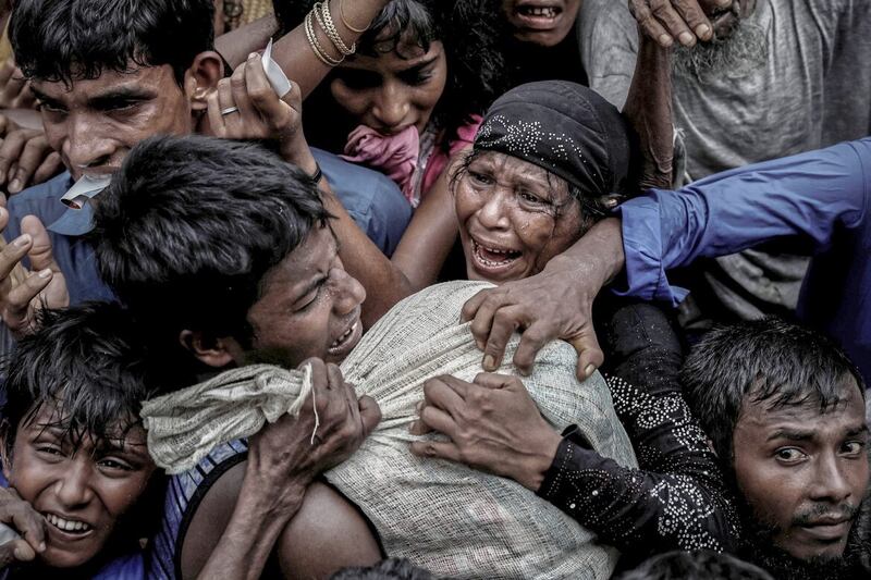 Rohingya refugees scramble for aid at a camp in Cox&#39;s Bazar, Bangladesh September 24 2017. Picture by Cathal McNaughton 