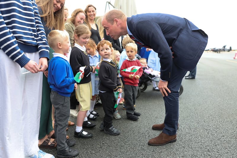 William meets members of the public at the air base