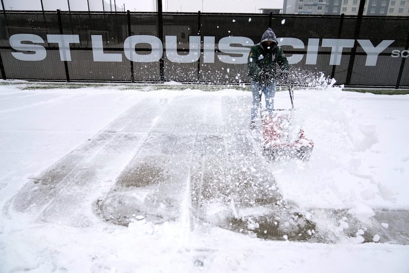 A pavement is cleared in St. Louis (Jeff Roberson/AP)