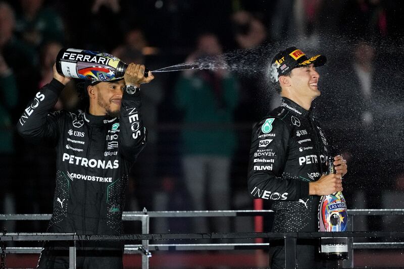 Lewis Hamilton joined his team-mate on the podium (Rick Scuteri/AP)