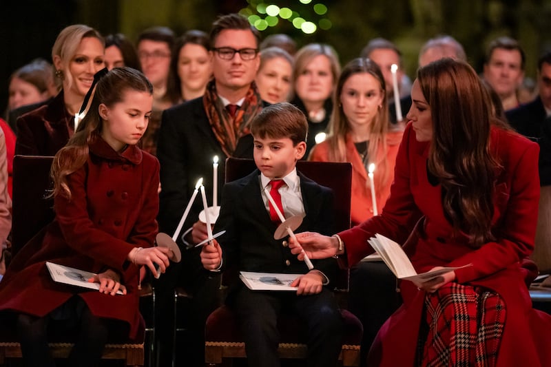 Princess Charlotte, Prince Louis and the Princess of Wales during the Together At Christmas carol service at Westminster Abbey