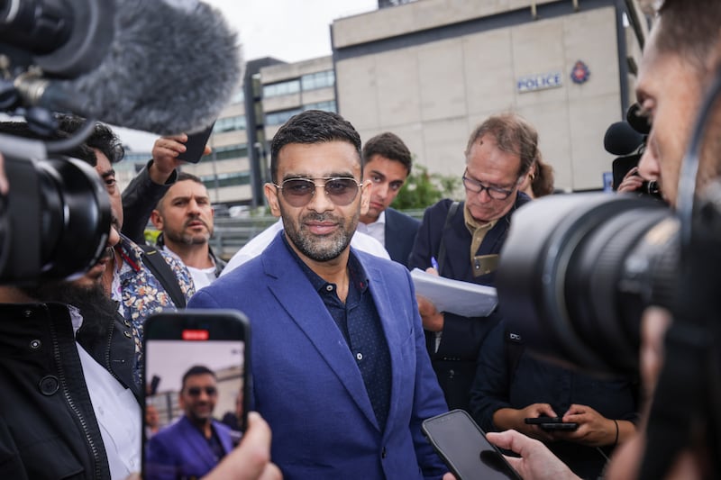 Solicitor Akhmed Yakoob speaks to the media outside Rochdale police station in Greater Manchester