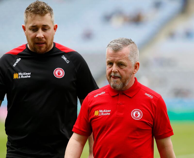Tyrone manager Stephen McGarry (left) was previously a coach under former boss Michael McShane