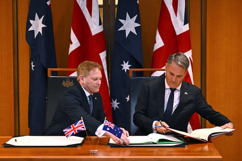 Defence Secretary Grant Shapps, left, and Australian defence minister Richard Marles (Lukas Coch/AAP Image/AP)