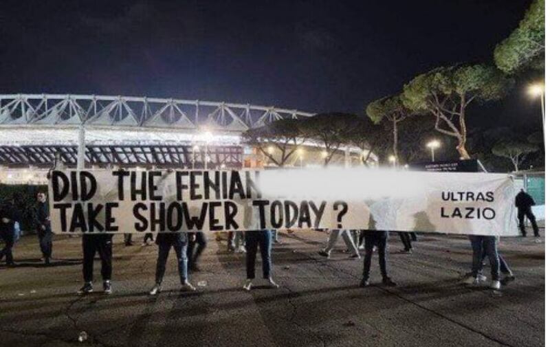 Lazio 'ultras', self described far right wingers, display a banner outside the Rome stadium 