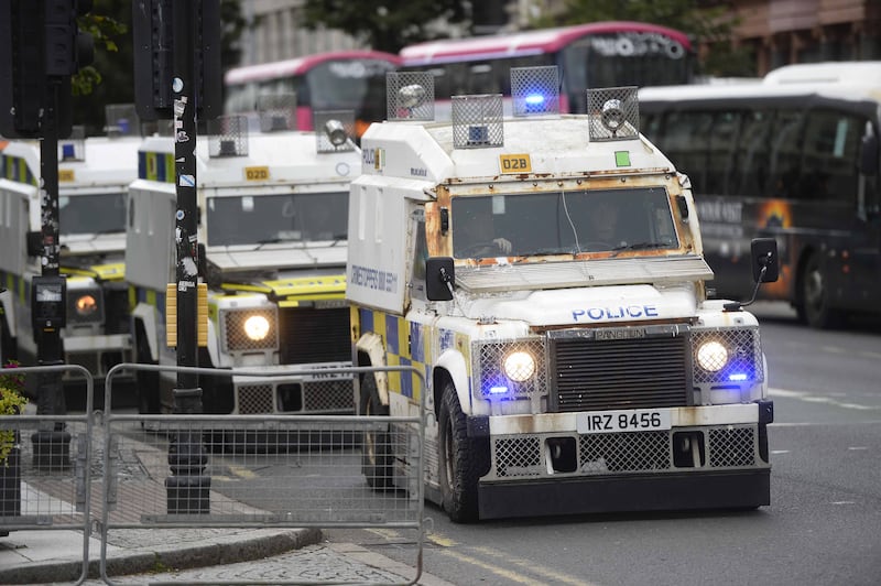 PSNI officers line the streets in Belfast city centre