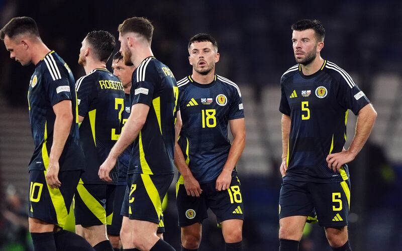 Scotland players react after the late blow