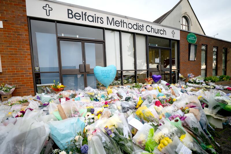 Flowers and tributes at the scene in Leigh-on-Sea, Essex, where Conservative MP Sir David Amess was attacked