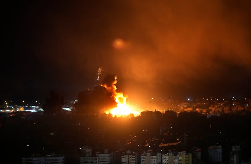 Flames rise from Israeli air strikes in Dahiyeh, Beirut (Hussein Malla/AP)