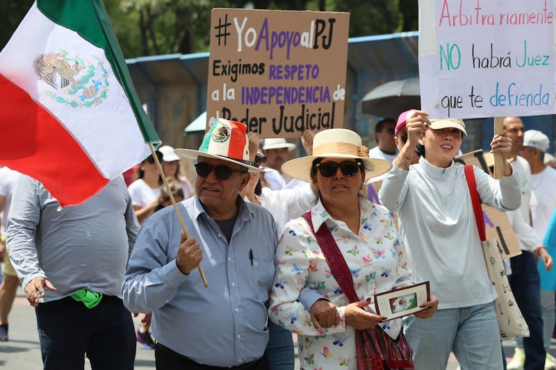 Many protesters are also upset by a proposal to do away with independent regulatory agencies (Ginnette Riquelme/AP)