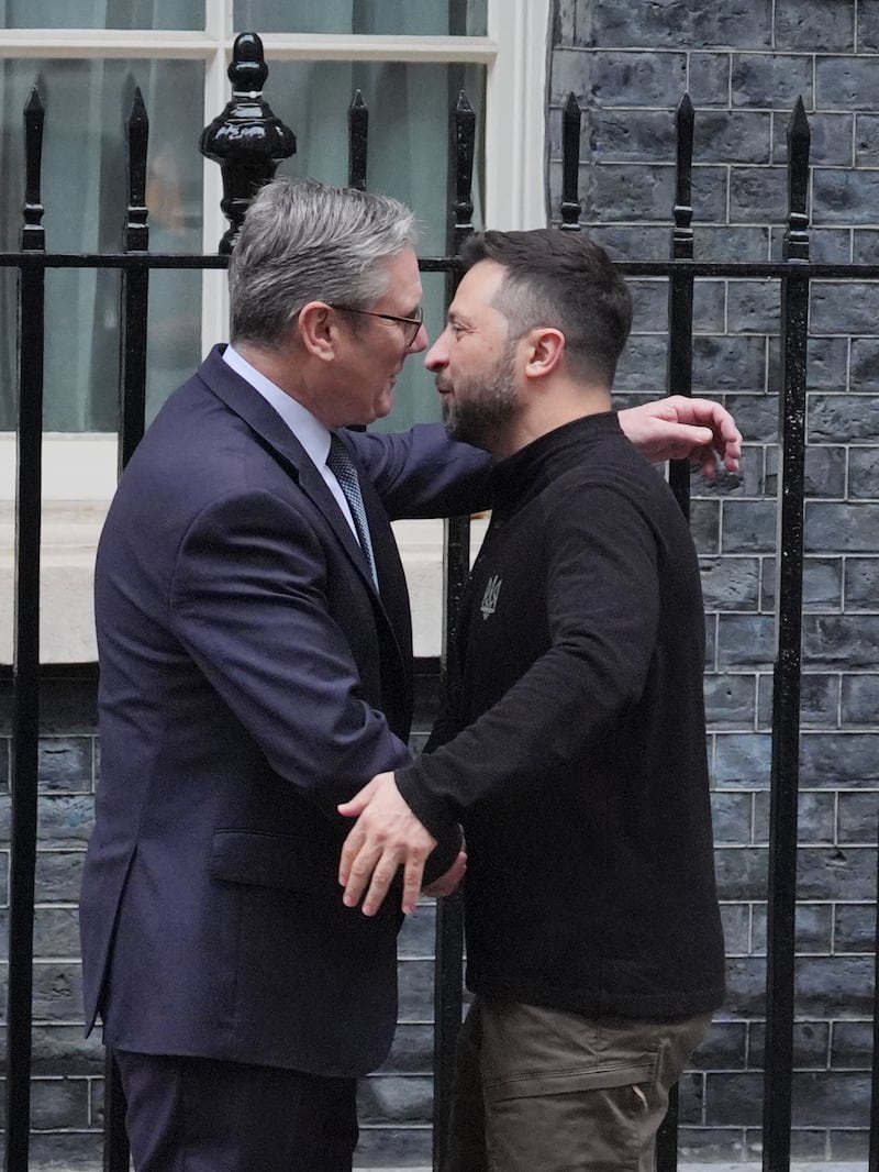 Ukrainian President Volodymyr Zelensky is embraced by Prime Minister Sir Keir Starmer as he arrives in Downing Street