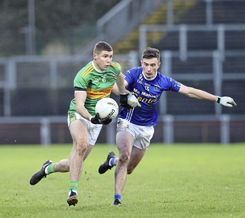 Scotstown's Shane Carey (right) attempts to curb Ciaran McFaul of Glen during their 2021 meeting. Picture by Margaret McLaughlin