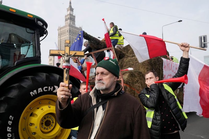 Polish farmers protest in Warsaw over EU agricultural policies and imports of cheap food from neighbouring Ukraine (Czarek Sokolowski/AP)