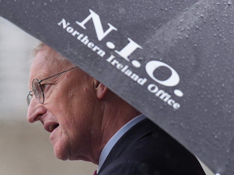 Northern Ireland Secretary Hilary Benn speaks to the media outside Waterfront Hall during a visit to Belfast