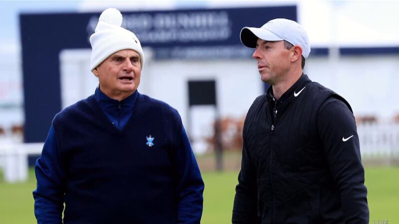 Jimmy Dunne (left) and Rory Mcilroy (right) having a chat