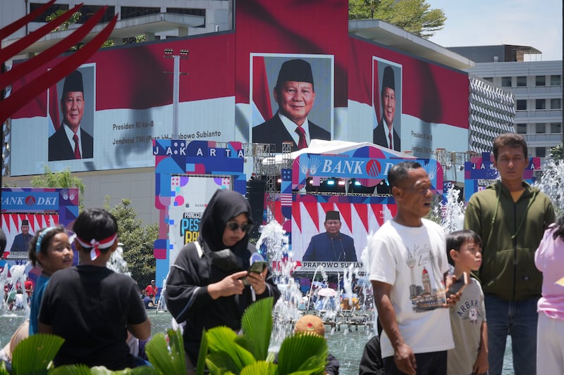 Banners and billboards to welcome the new president filled the streets of the capital, Jakarta (Dita Alangkara/AP)