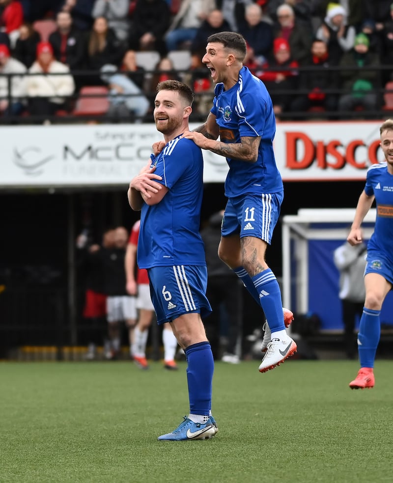 Derriaghy’s Jordan Malone celebrates scoring in the first half