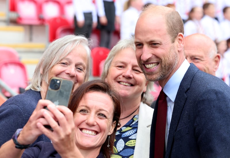 William has a selfie taken on the pitch at the home of the Scarlets rugby union team